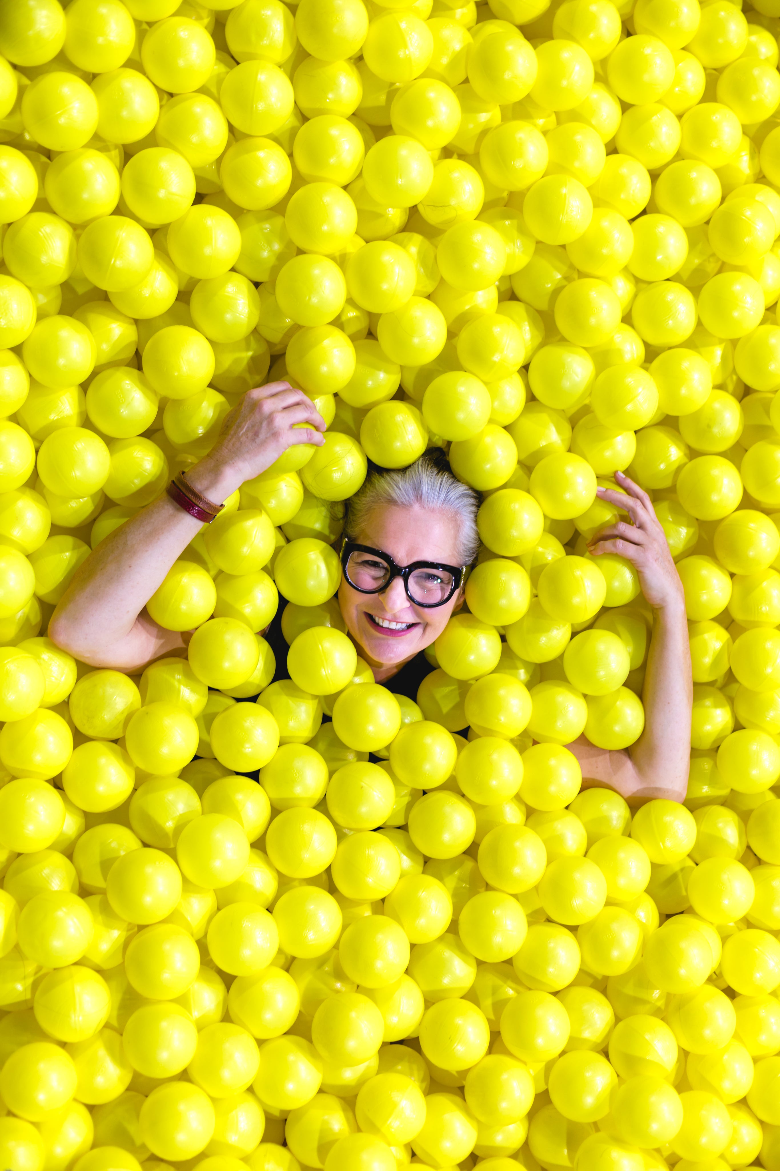 files/smiling-senior-in-yellow-ball-pit.jpg